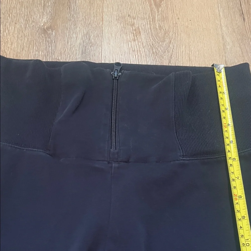 Nike Women’s front Zipper on high waist Black Joggers with White Mesh Large